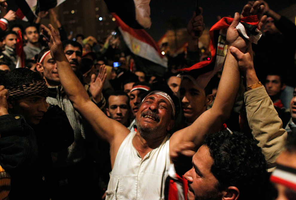 After Egypt's military announced on national television that the protesters’ demands would be met, the crowd celebrates. That joy turned to seething anger hours later when President Mubarak vowed to stay in office until September. (Tara Todras-Whitehill/Associated Press)
