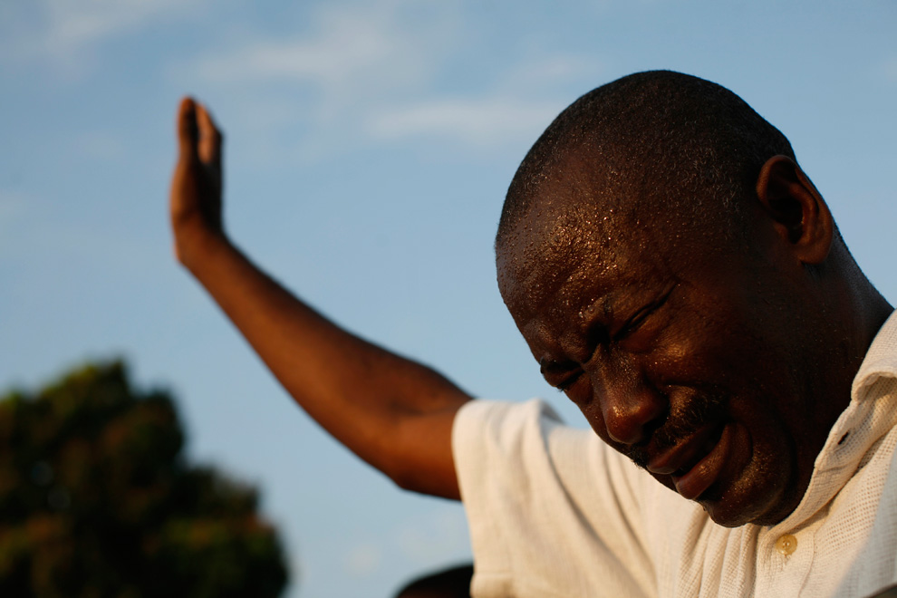 A Haitian cries during a national day of mourning